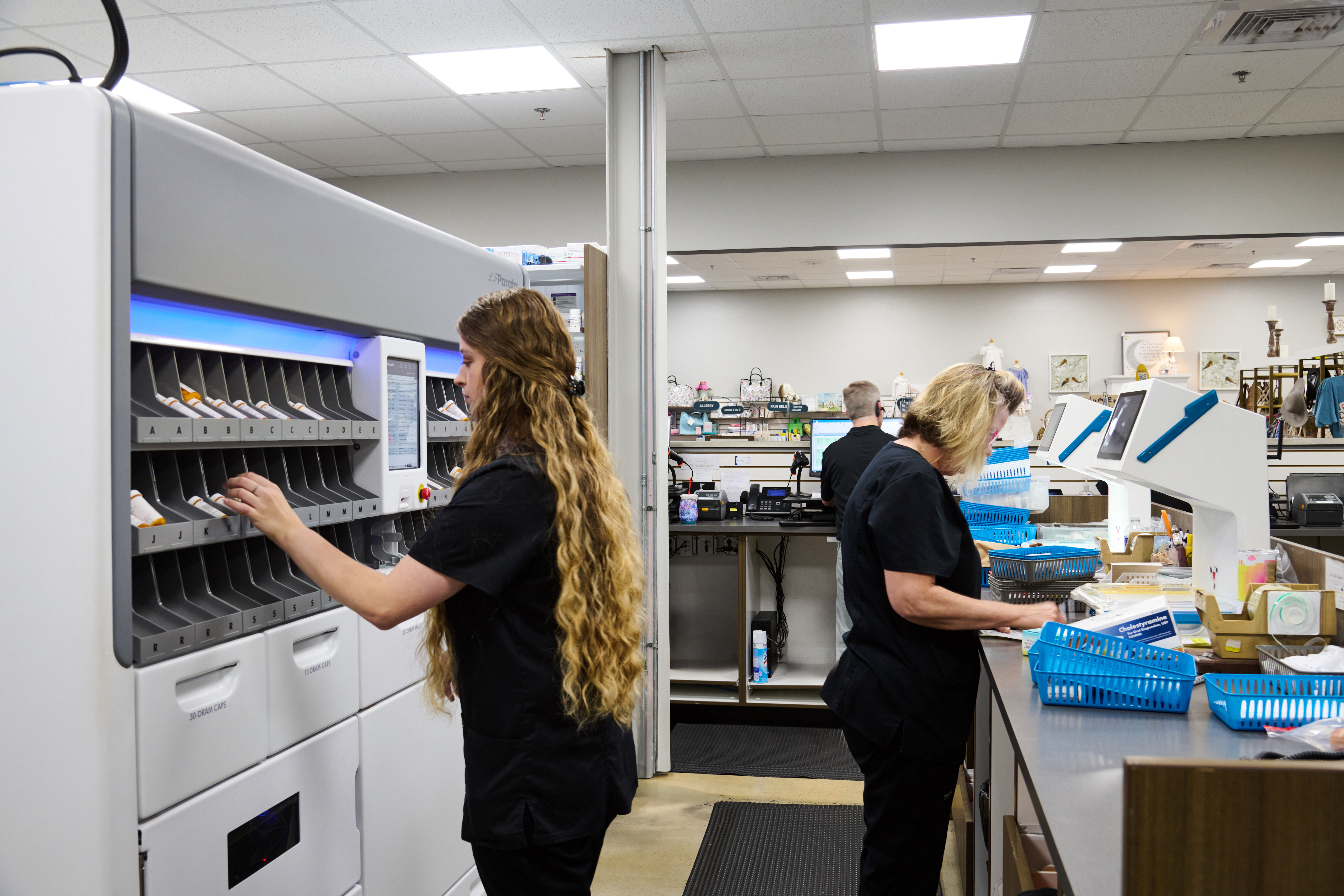 Pharmacy technicians at APCI member Marble City Pharmacy prepare prescriptions for patient pickup